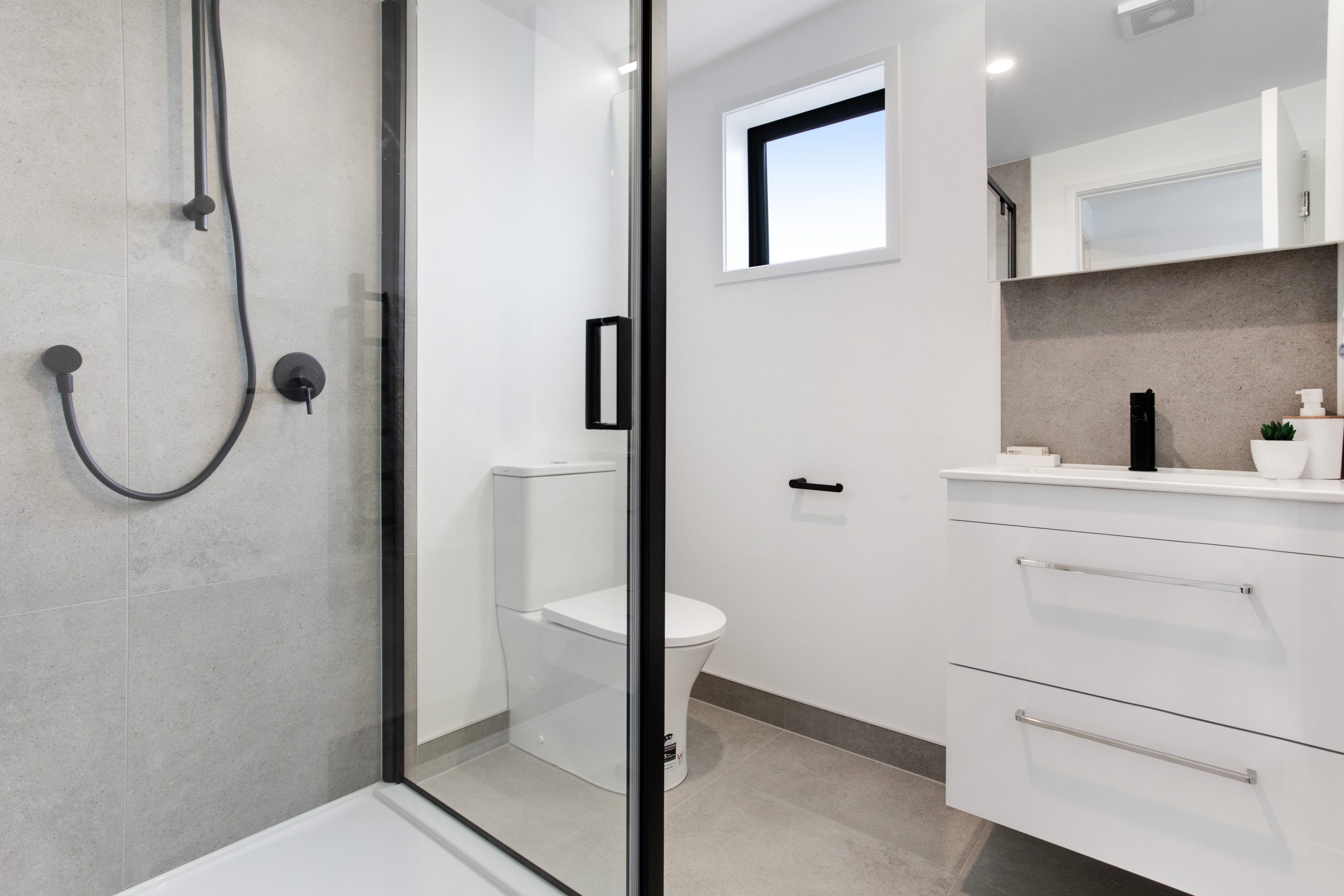 Bathroom #1 with shower, toilet and vanity 